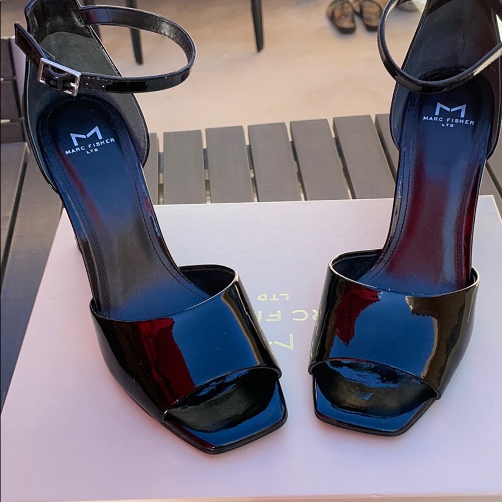 Black ankle strap four inch heels leather